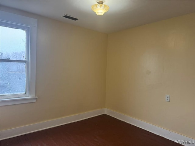 231 Grider St, Buffalo, NY 14215 - empty room with baseboards and dark wood-style floors