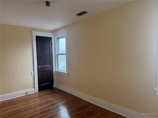 231 Grider St, Buffalo, NY 14215 - empty room featuring baseboards and dark wood finished floors