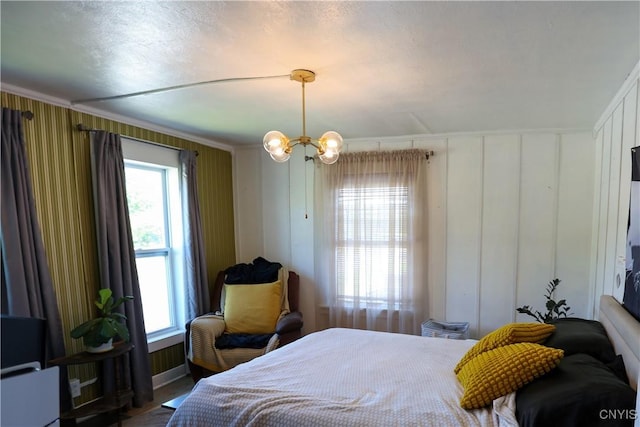 285 Clinton St, Gouverneur, NY 13642 - bedroom featuring a chandelier
