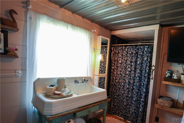 285 Clinton St, Gouverneur, NY 13642 - full bathroom featuring healthy amount of natural light and a shower with shower curtain