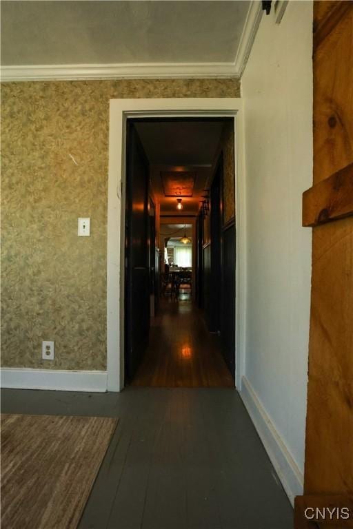 285 Clinton St, Gouverneur, NY 13642 - corridor with baseboards, dark wood-style floors, and crown molding