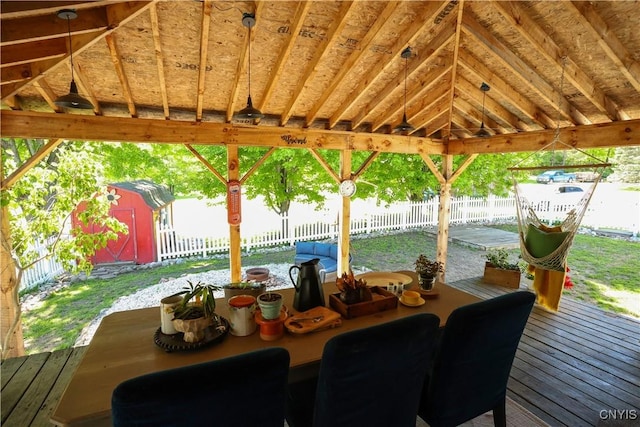 285 Clinton St, Gouverneur, NY 13642 - deck with a fenced backyard, a gazebo, and outdoor dining area