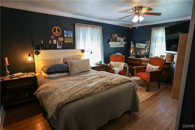 285 Clinton St, Gouverneur, NY 13642 - bedroom with multiple windows, crown molding, hardwood / wood-style flooring, and a ceiling fan