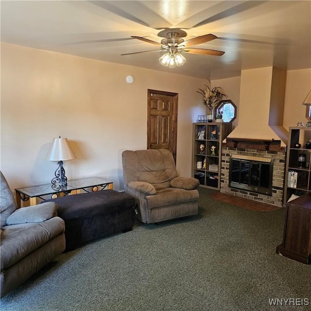 living room featuring carpet flooring, ceiling fan, and a fireplace