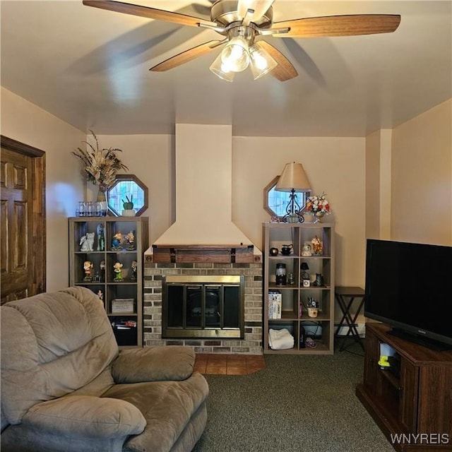 living room with carpet and a ceiling fan