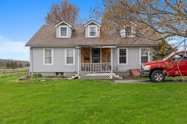 2066 Deerlick Rd, Cape Vincent, NY 13618 - cape cod house featuring a shingled roof