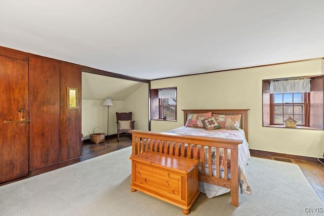 2066 Deerlick Rd, Cape Vincent, NY 13618 - carpeted bedroom with vaulted ceiling and baseboards