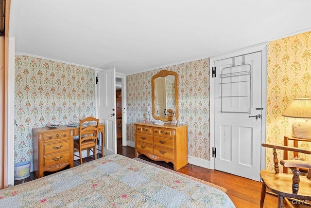 2066 Deerlick Rd, Cape Vincent, NY 13618 - bedroom featuring wood finished floors, wallpapered walls, ornamental molding, and baseboards