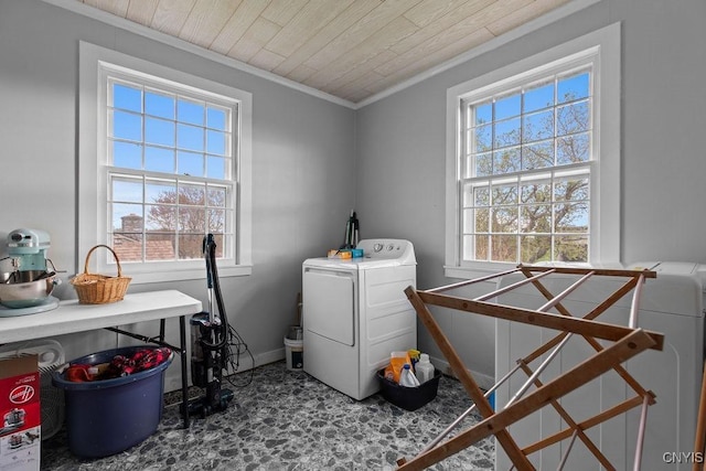 2066 Deerlick Rd, Cape Vincent, NY 13618 - laundry room featuring ornamental molding, baseboards, wood ceiling, and separate washer and dryer