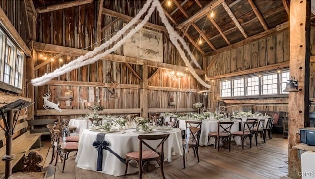 2066 Deerlick Rd, Cape Vincent, NY 13618 - miscellaneous room featuring high vaulted ceiling, wooden walls, and wood finished floors
