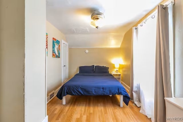 bedroom featuring wood finished floors