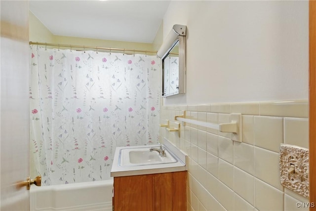 106 Lee Ter, Manlius, NY 13057 - bathroom featuring shower / tub combo with curtain, vanity, and tile walls