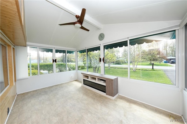 unfurnished sunroom with ceiling fan and healthy amount of natural light