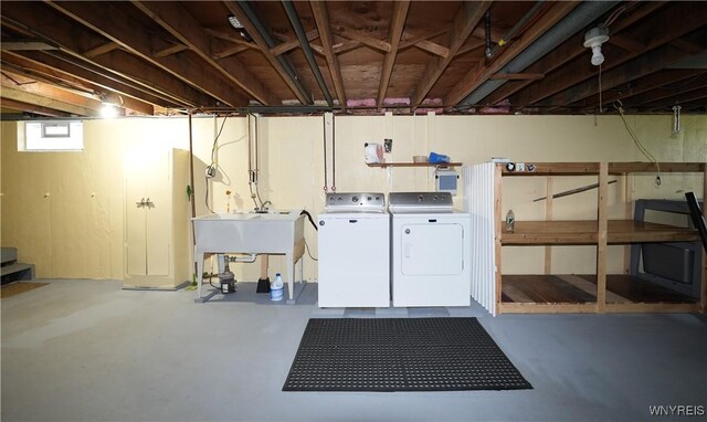 basement with washer and dryer