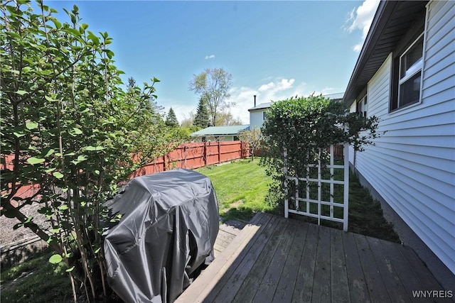 deck featuring a grill