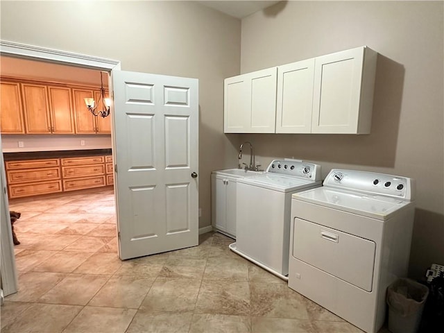 laundry room with cabinet space and washer and dryer