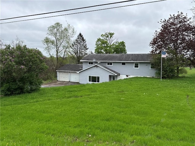 37 Hilltop Dr, Schroeppel, NY 13135 - back of property featuring a yard, a garage, and driveway