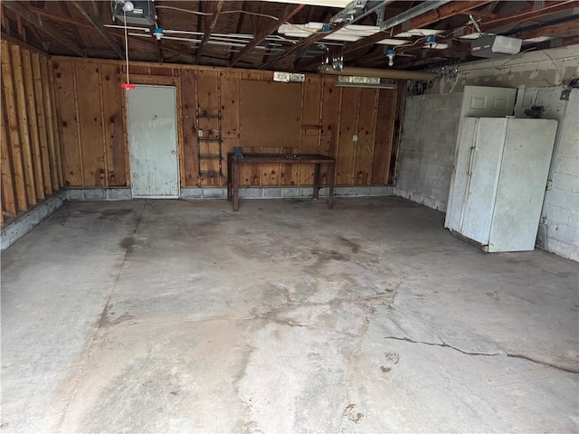 37 Hilltop Dr, Schroeppel, NY 13135 - garage featuring a garage door opener