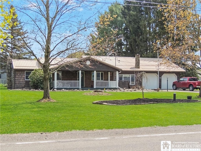 3830 E Ross Mills Rd, Ellicott, NY 14733 - single story home featuring a porch, a chimney, a garage, and a front lawn
