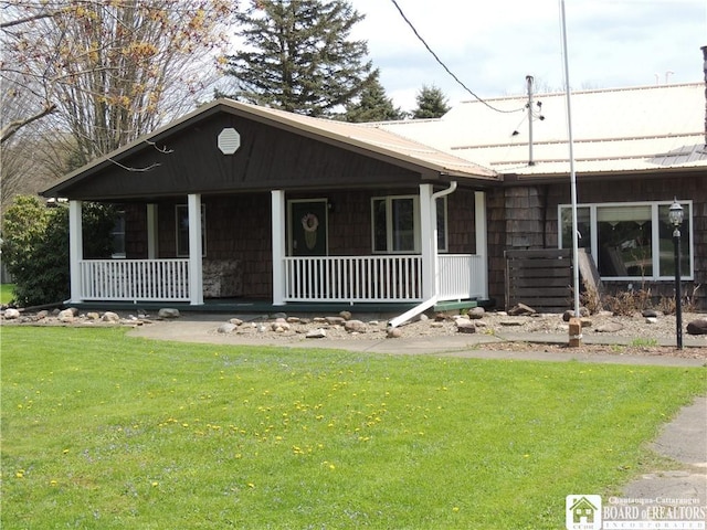 3830 E Ross Mills Rd, Ellicott, NY 14733 - view of front of house featuring covered porch and a front yard