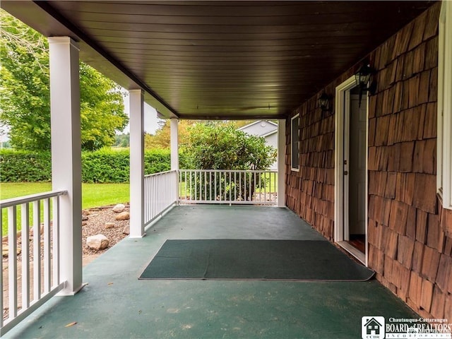 3830 E Ross Mills Rd, Ellicott, NY 14733 - view of patio / terrace with covered porch