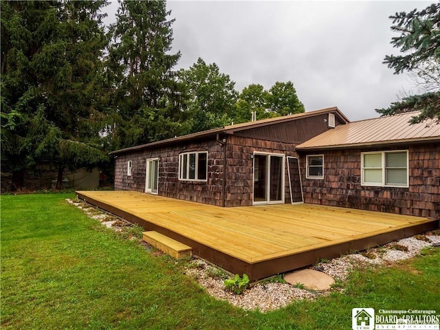 3830 E Ross Mills Rd, Ellicott, NY 14733 - rear view of property featuring a lawn, a wooden deck, and metal roof