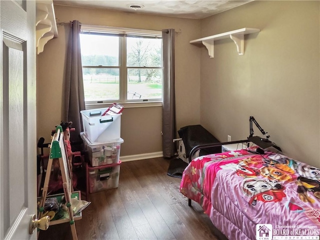 3830 E Ross Mills Rd, Ellicott, NY 14733 - bedroom featuring hardwood / wood-style floors and baseboards
