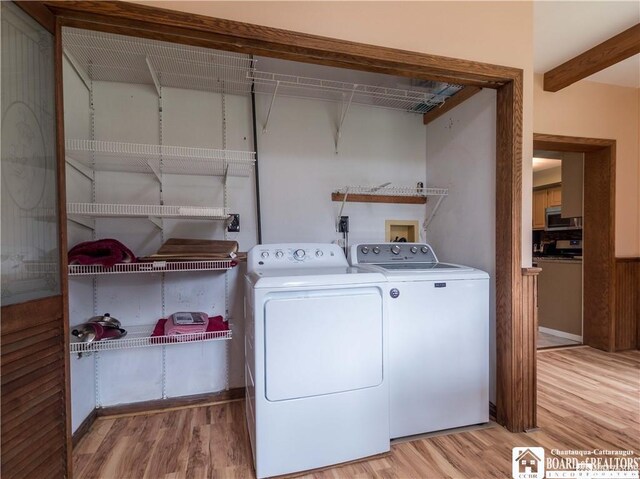 3830 E Ross Mills Rd, Ellicott, NY 14733 - laundry area featuring independent washer and dryer and light wood-type flooring