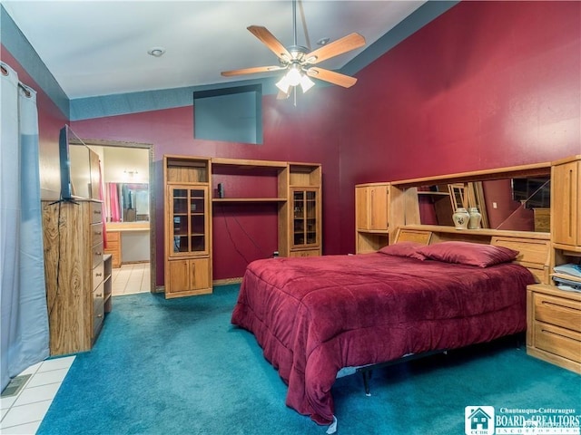 3830 E Ross Mills Rd, Ellicott, NY 14733 - carpeted bedroom featuring connected bathroom, ceiling fan, and high vaulted ceiling