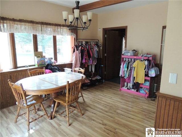 3830 E Ross Mills Rd, Ellicott, NY 14733 - dining area with wood finished floors and a chandelier