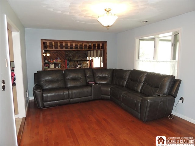 3830 E Ross Mills Rd, Ellicott, NY 14733 - living room featuring wood finished floors and baseboards