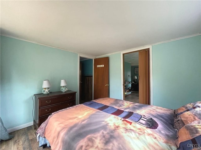 43815 Stine Rd, Alexandria, NY 13679 - bedroom featuring wood finished floors, baseboards, and crown molding
