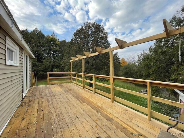 43815 Stine Rd, Alexandria, NY 13679 - wooden deck with view of scattered trees