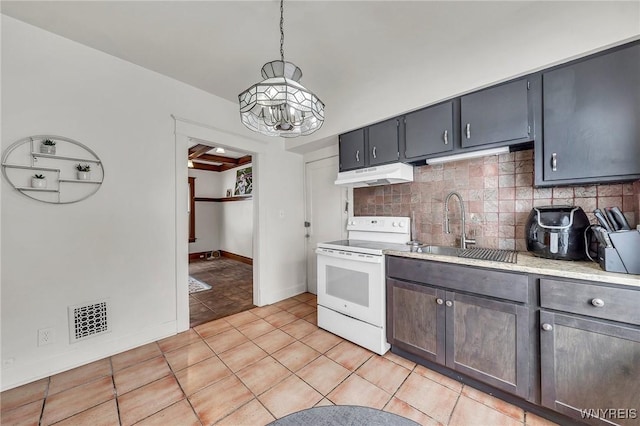 61 Norwalk Ave, Buffalo, NY 14216 - kitchen featuring white electric range oven, under cabinet range hood, a sink, a chandelier, and tasteful backsplash