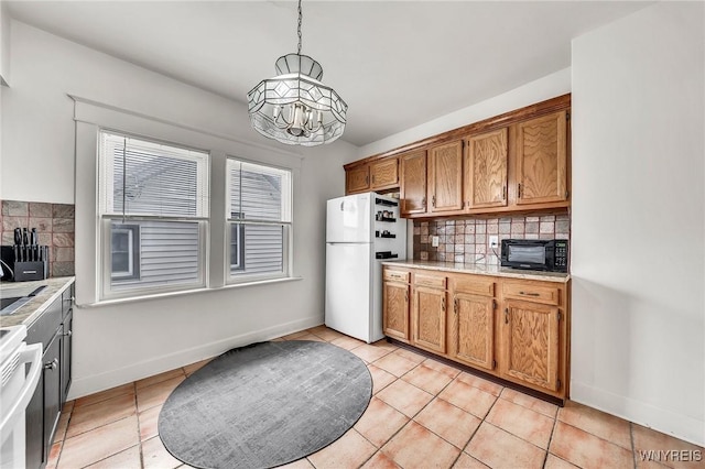 61 Norwalk Ave, Buffalo, NY 14216 - kitchen featuring white appliances, a chandelier, backsplash, and brown cabinets