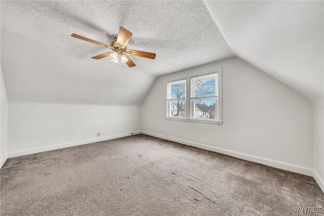 61 Norwalk Ave, Buffalo, NY 14216 - bonus room featuring vaulted ceiling, a ceiling fan, carpet floors, baseboards, and a textured ceiling