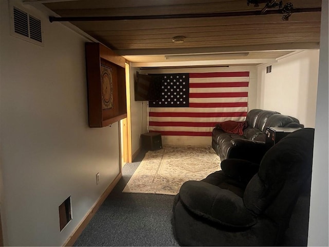 home theater featuring carpet and baseboards
