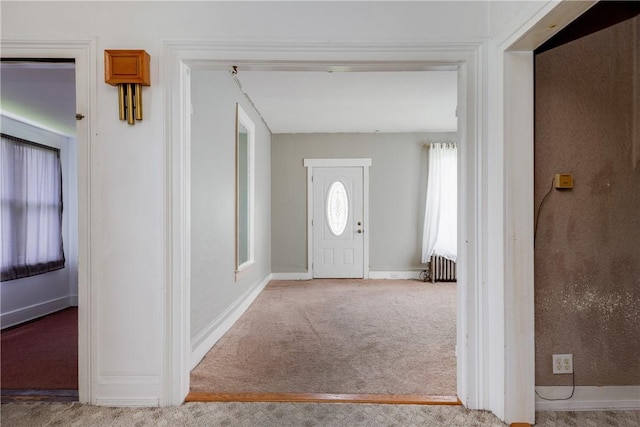448 Old Ithaca Rd, Horseheads, NY 14845 - carpeted entryway with radiator heating unit and baseboards