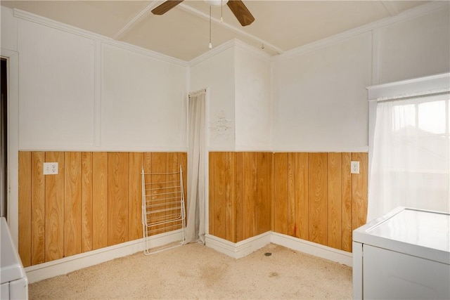 448 Old Ithaca Rd, Horseheads, NY 14845 - empty room featuring a ceiling fan, carpet floors, wood walls, and washer / dryer