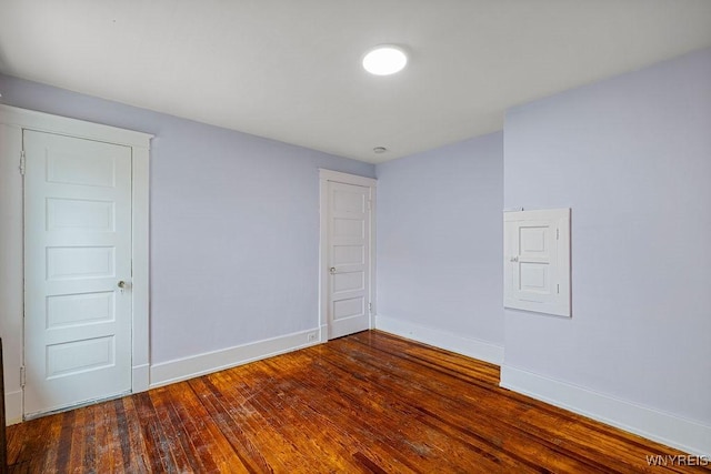 44 Christiana St, North Tonawanda, NY 14120 - spare room with baseboards and dark wood-style flooring