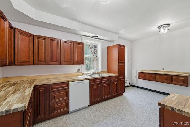 44 Christiana St, North Tonawanda, NY 14120 - kitchen with white dishwasher, butcher block countertops, and a sink