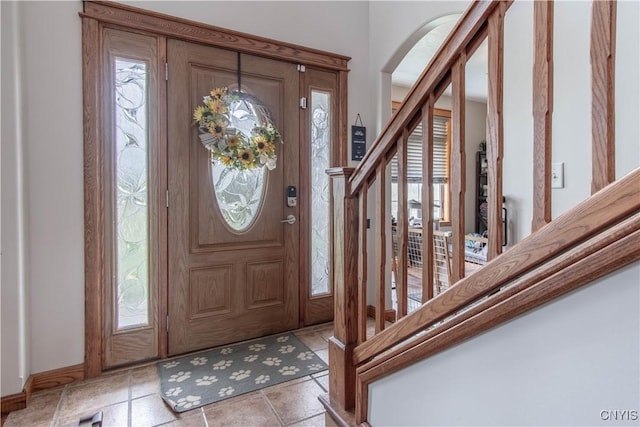 20948 Nys Rte 180, Hounsfield, NY 13634 - entrance foyer with stairs, arched walkways, and baseboards