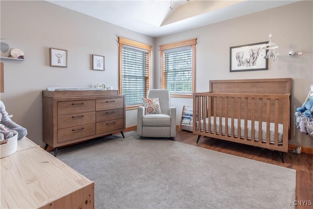 20948 Nys Rte 180, Hounsfield, NY 13634 - bedroom with wood finished floors and a nursery area