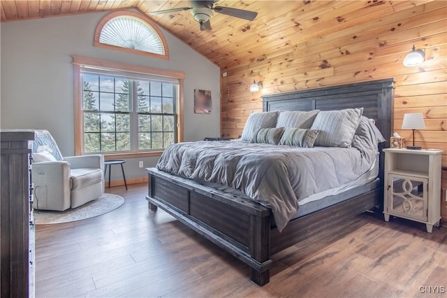 20948 Nys Rte 180, Hounsfield, NY 13634 - bedroom with multiple windows, lofted ceiling, wooden walls, wooden ceiling, and wood finished floors