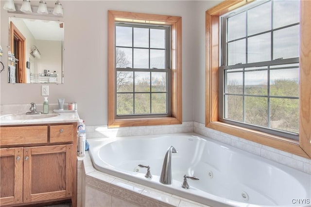 20948 Nys Rte 180, Hounsfield, NY 13634 - full bathroom with healthy amount of natural light, a whirlpool tub, and vanity