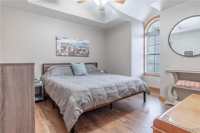 20948 Nys Rte 180, Hounsfield, NY 13634 - bedroom featuring wood finished floors, multiple windows, baseboards, a ceiling fan, and lofted ceiling