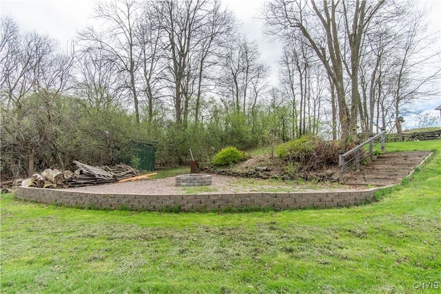 20948 Nys Rte 180, Hounsfield, NY 13634 - view of green lawn with an outdoor fire pit