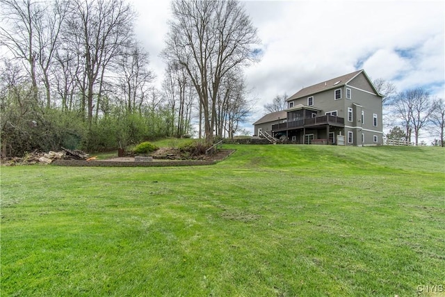 20948 Nys Rte 180, Hounsfield, NY 13634 - view of green lawn with a wooden deck