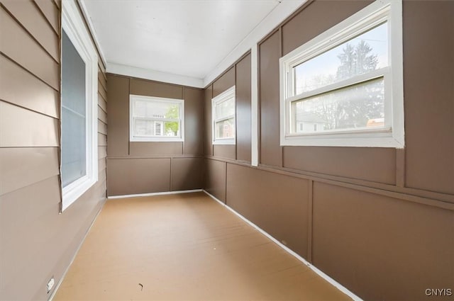 212 N Broad St, Oneida-Inside, NY 13421 - spare room with a decorative wall