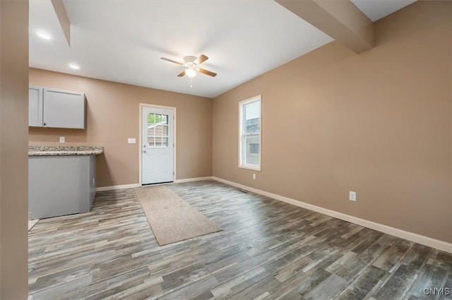 212 N Broad St, Oneida-Inside, NY 13421 - entryway with ceiling fan, wood finished floors, and baseboards